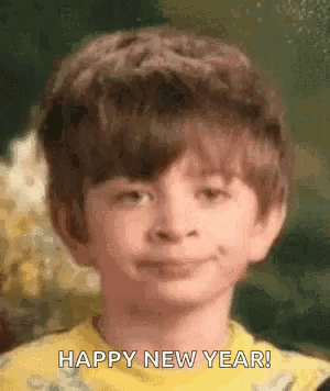 Boy in Yellow Shirt Saying Happy New Year