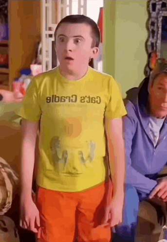 Boy in Yellow T-Shirt Saying Gilberto