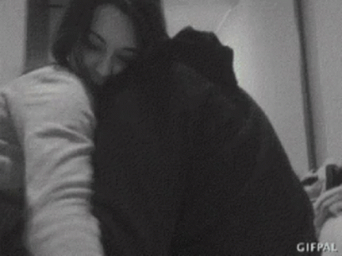Boy Kissing Girl on Cheek