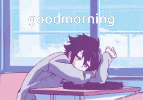 Boy Laying on Table Saying Good Morning