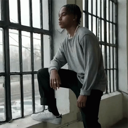 Boy Looking Out The Window GIF