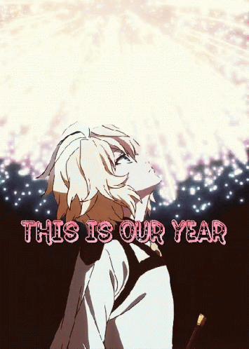 Boy Looking Up at Fireworks Saying This Is Our Year