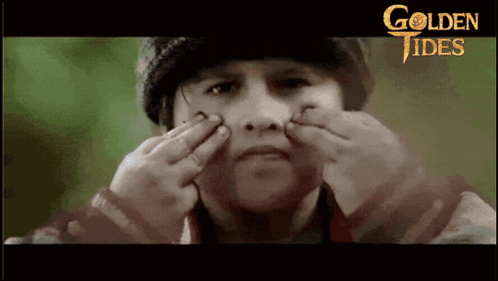 Boy Making Funny Face In Golden Tides Poster GIF