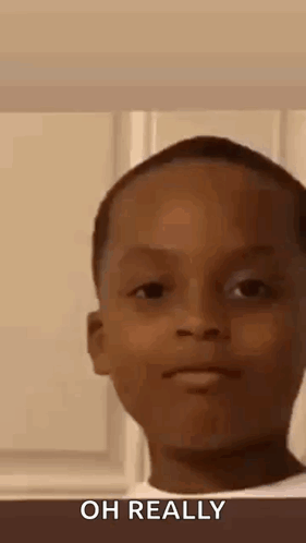 Boy Making Funny Face Saying Oh Really