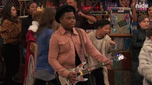 Boy Playing Guitar With Game Over Sticker GIF