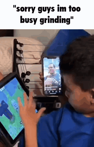 Boy Playing Video Game on Tablet Another Boy on Phone