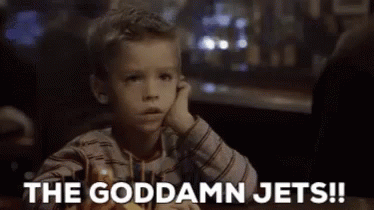 Boy Sitting With Hand On Chin Saying The Goddamn Jets GIF