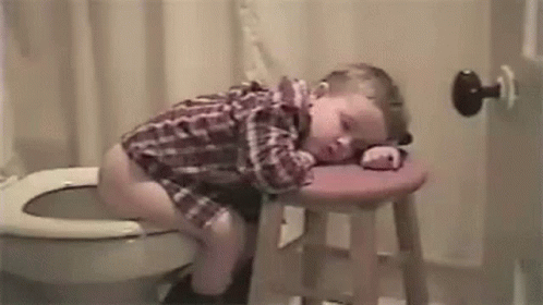 Boy Sleeping on Stool