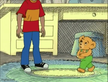 Boy Standing Next to Teddy Bear