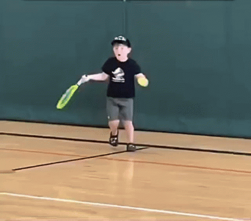 Boy Tennis Racket Swing And A Miss GIF