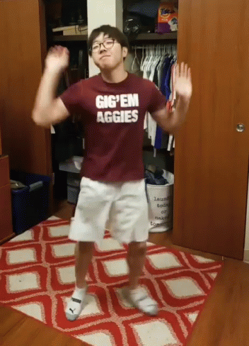 Boy Wearing Gig Em Aggies Shirt Dancing