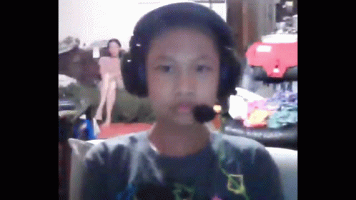 Boy Wearing Headphones and Microphone