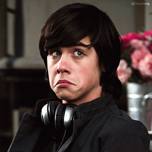 Boy Wearing Headphones Making Funny Face