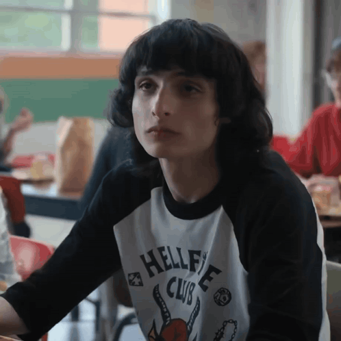 Boy Wearing Hellfire Club Shirt