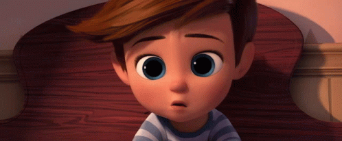 Boy with Big Blue Eyes Sitting