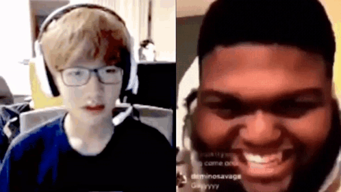 Boy With Glasses and Headphones Talking to Bearded Man