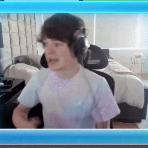 Boy With Headphones and Champions Shirt