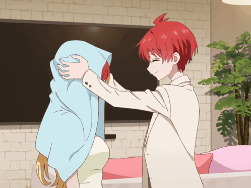 Boy with Red Hair Hugging Girl with Blue Towel