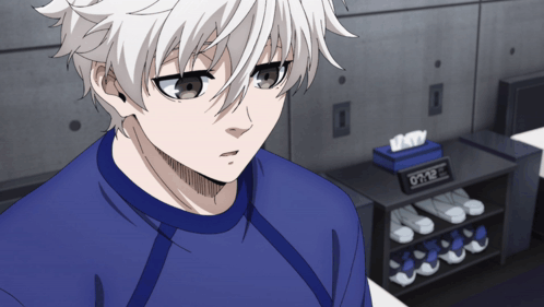Boy with White Hair and Blue Shirt Looking