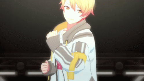 Boy With Yellow Hair in Jacket With Yellow Sleeve Stripes