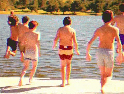 Boys Running Into Water
