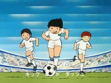 Boys Running with Soccer Ball