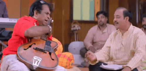 Brahmi Explaining Scolding Friend GIF