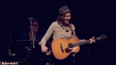 Brandi Carlile Playing Guitar Gun GIF