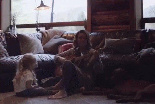 Brandi Carlile Playing Guitar With Kids GIF