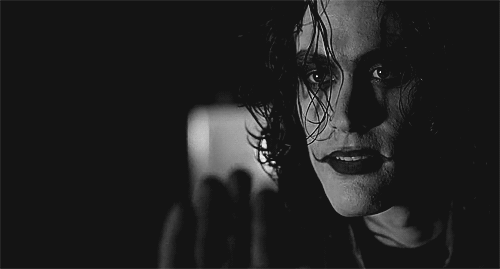 Brandon Lee Covers Gun Hole GIF
