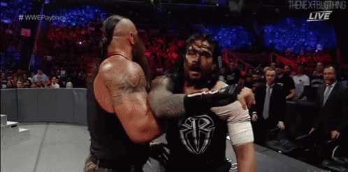 Braun Strowman Chokeslam Roman Reigns On Announcers Table GIF