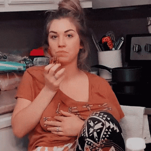 Breastfeeding Mother Eating Cookie GIF