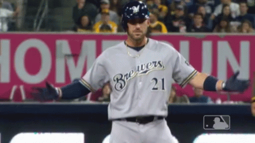 Brewers Baseball Player in Front of Pink Sign
