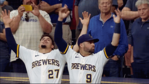 Brewers Players 27 and 9 Celebrating Arms Up