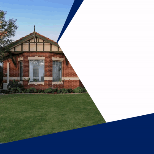 Brick House with Green Lawn and Blue Sky