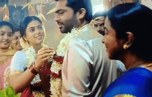 Bride and Groom at Wedding With Crowd