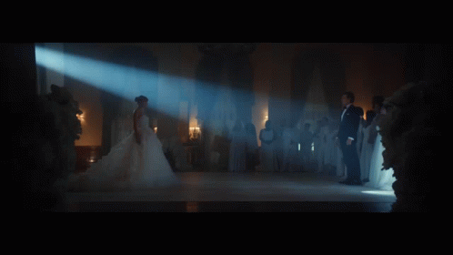 Bride and Groom Dancing in Ballroom