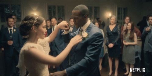 Bride and Groom Dancing with Netflix Logo
