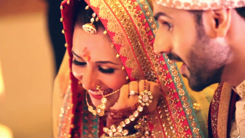Bride and Groom Getting Married With Yellow Veil