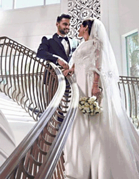 Bride and Groom Holding Hands