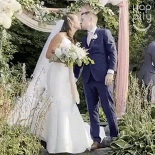 Bride And Groom Kissing GIF