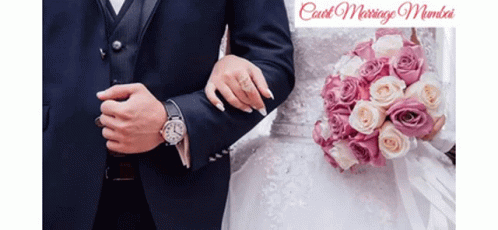 Bride and Groom Standing With Bouquet