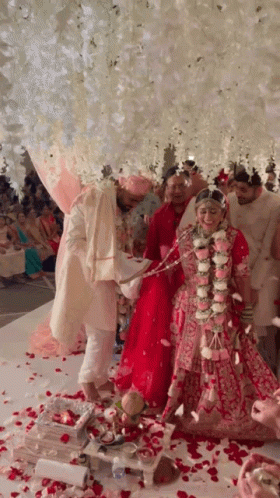 Bride And Groom Under White Canopy GIF