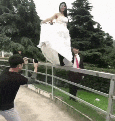 Bride Falls During Photoshoot GIF