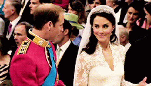 Bride In Tiara With Groom And Crowd GIF