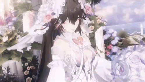 Bride in Wedding Dress Standing in Front of Bouquet