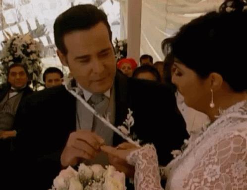 Bride In White Lace Dress With Groom GIF
