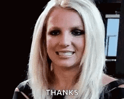 Britney Spears Is Smiling And Giving A Thanks Gesture . GIF