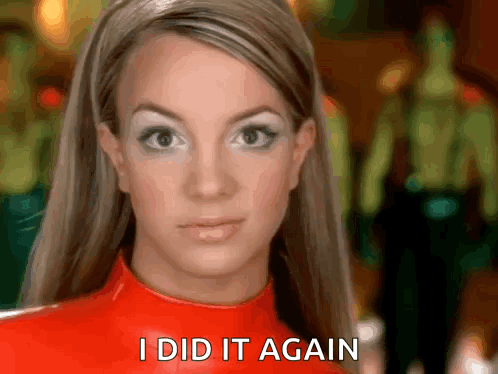 Britney Spears Is Wearing A Red Jumpsuit And Says I Did It Again . GIF