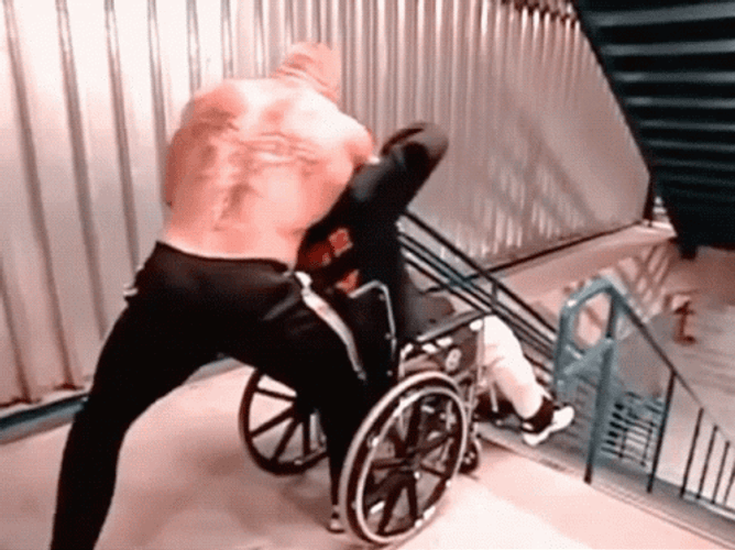 Brock Lesnar Pushed Wheelchair GIF